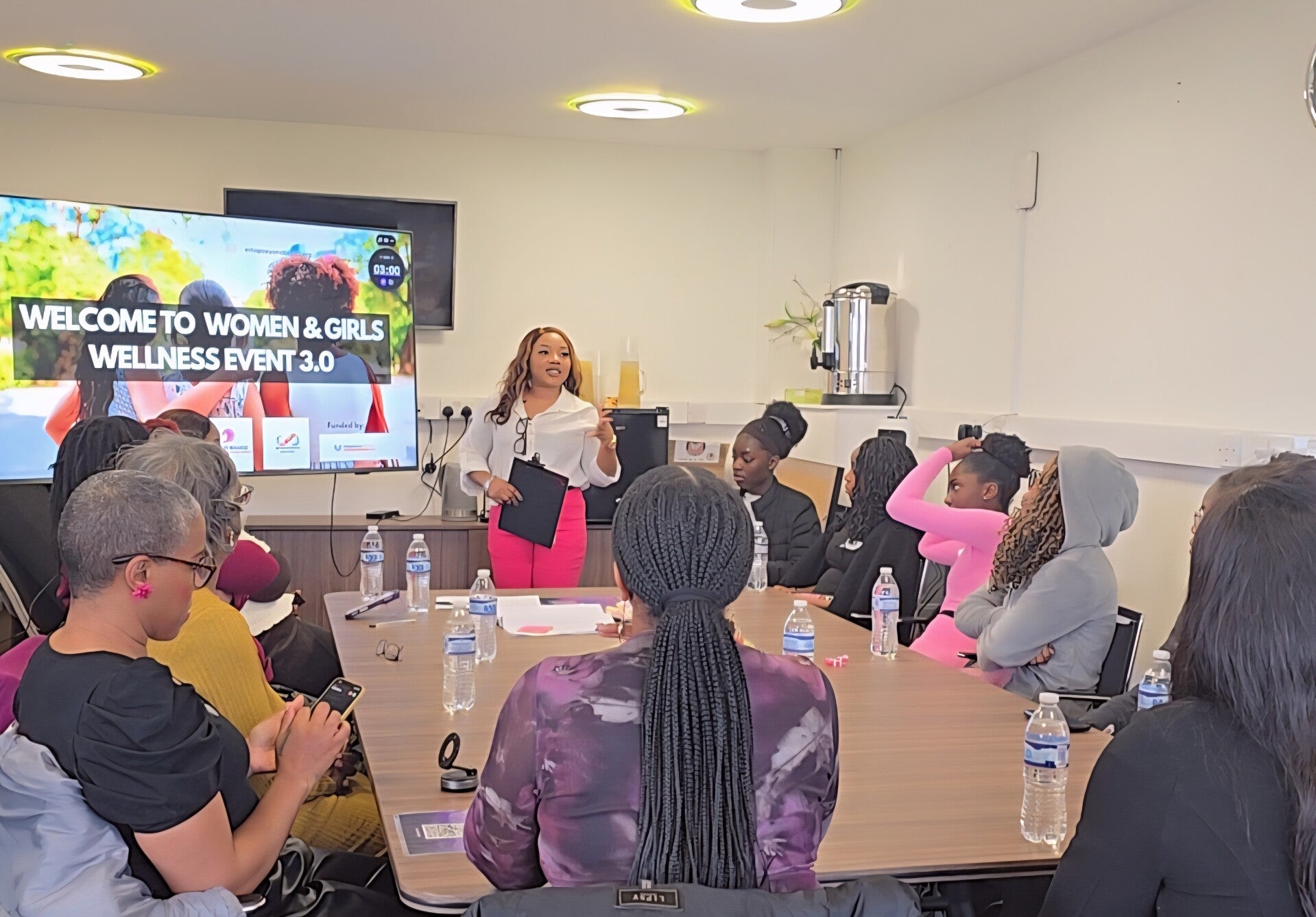 Founder speaking at a Women & Girls Wellness Event session